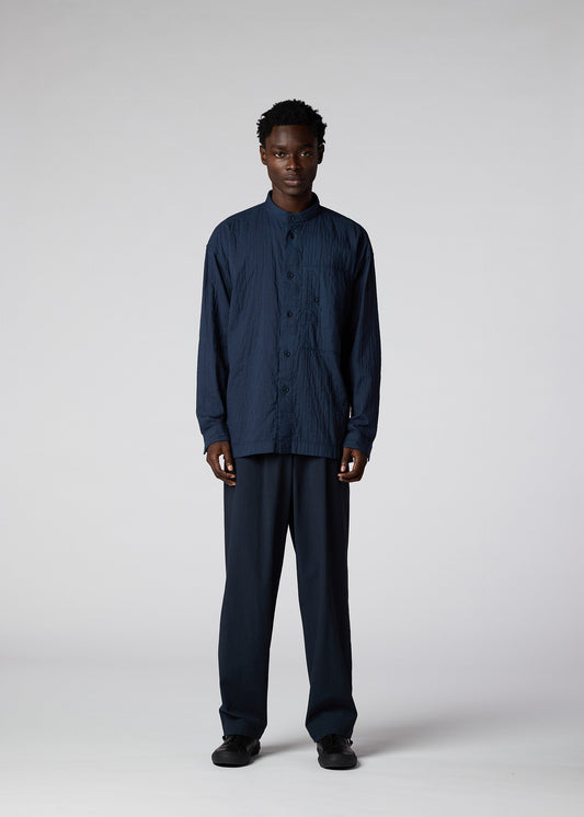 A model wears the IM MEN DOUBLE FACE COTTON SHIRT shirt.