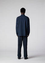 A model wears the IM MEN DOUBLE FACE COTTON SHIRT shirt.