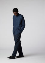 A model wears the IM MEN DOUBLE FACE COTTON SHIRT shirt.