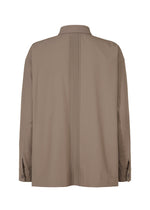 A detail shot of the IM MEN PLEATS SHIRT shirt.