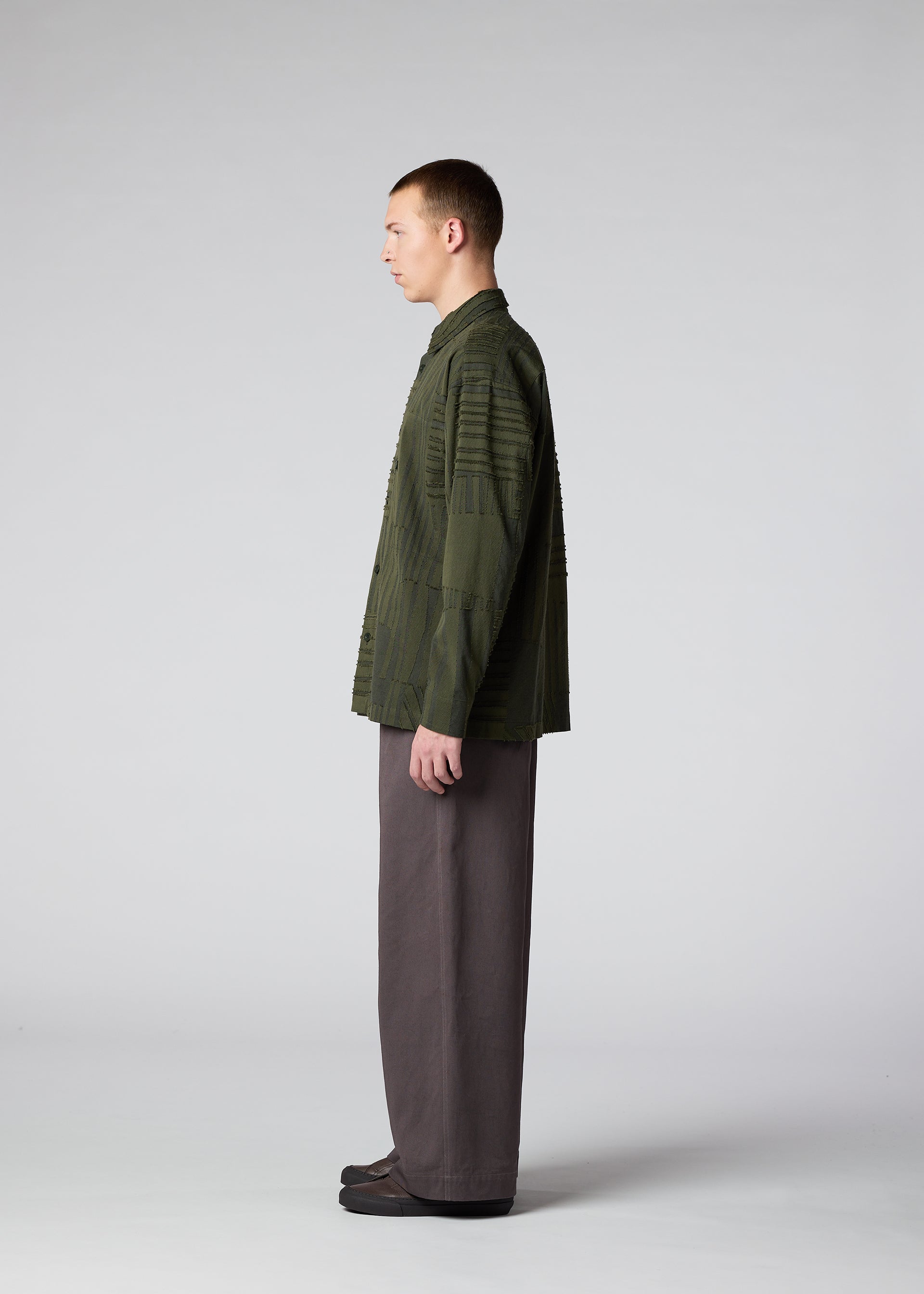 A model wears the IM MEN GEOMETRY JACQUARD SHIRT shirt.