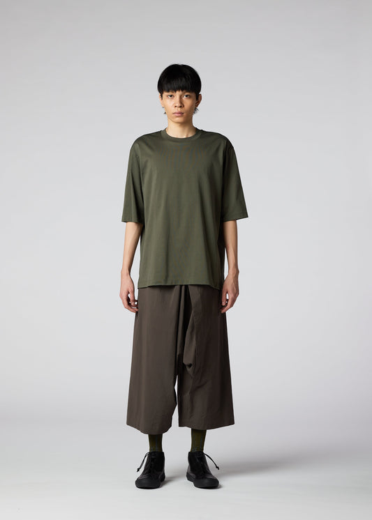 A model wears the IM MEN 60/2 JERSEY STITCH top.