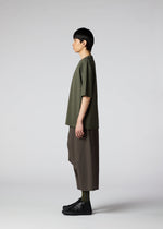 A model wears the IM MEN 60/2 JERSEY STITCH top.