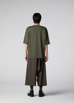 A model wears the IM MEN 60/2 JERSEY STITCH top.