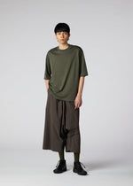 A model wears the IM MEN 60/2 JERSEY STITCH top.