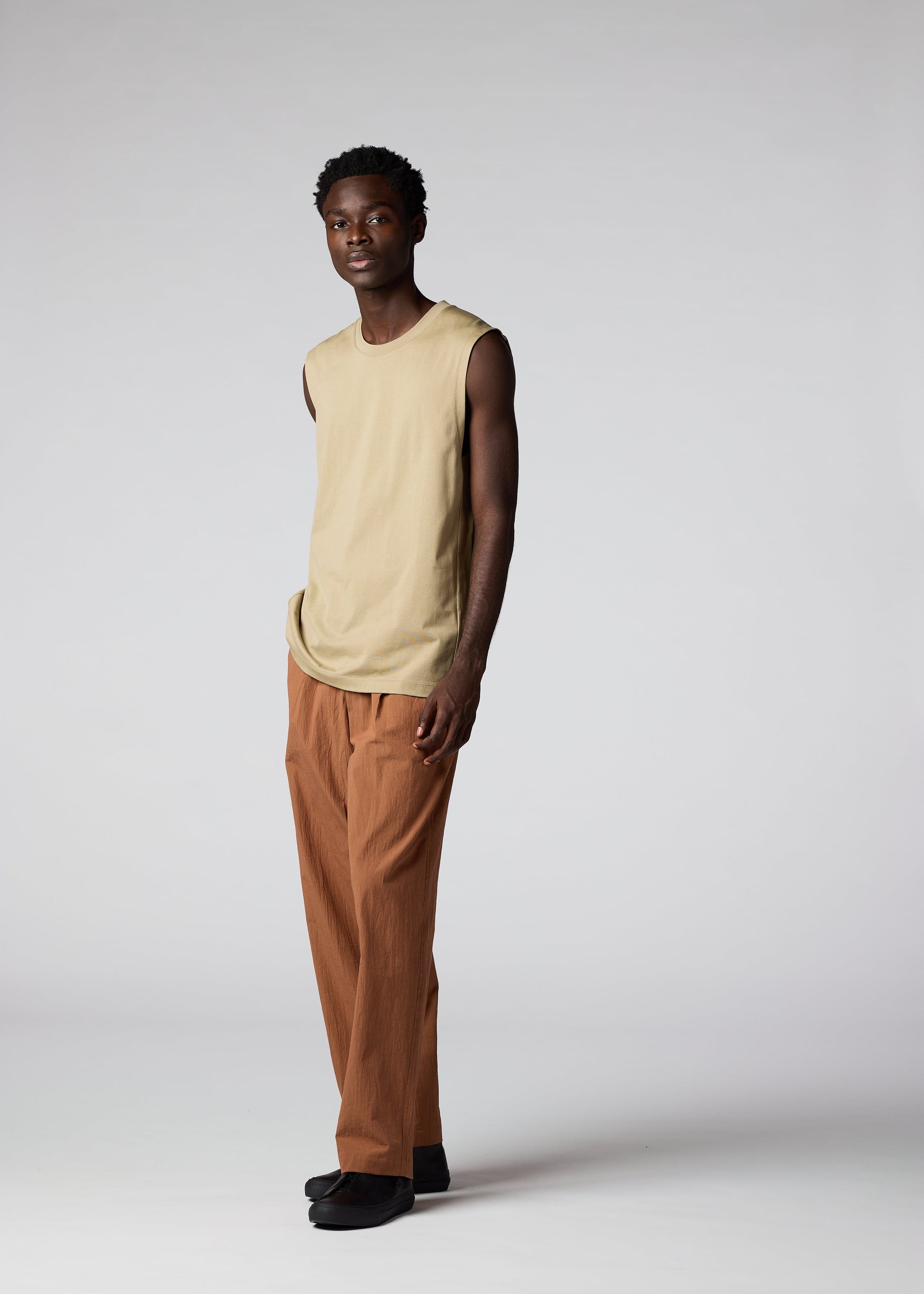 A model wears the IM MEN 60/2 JERSEY STITCH top.