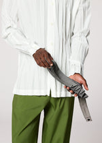 A model wears the IM MEN GURU GURU bag.