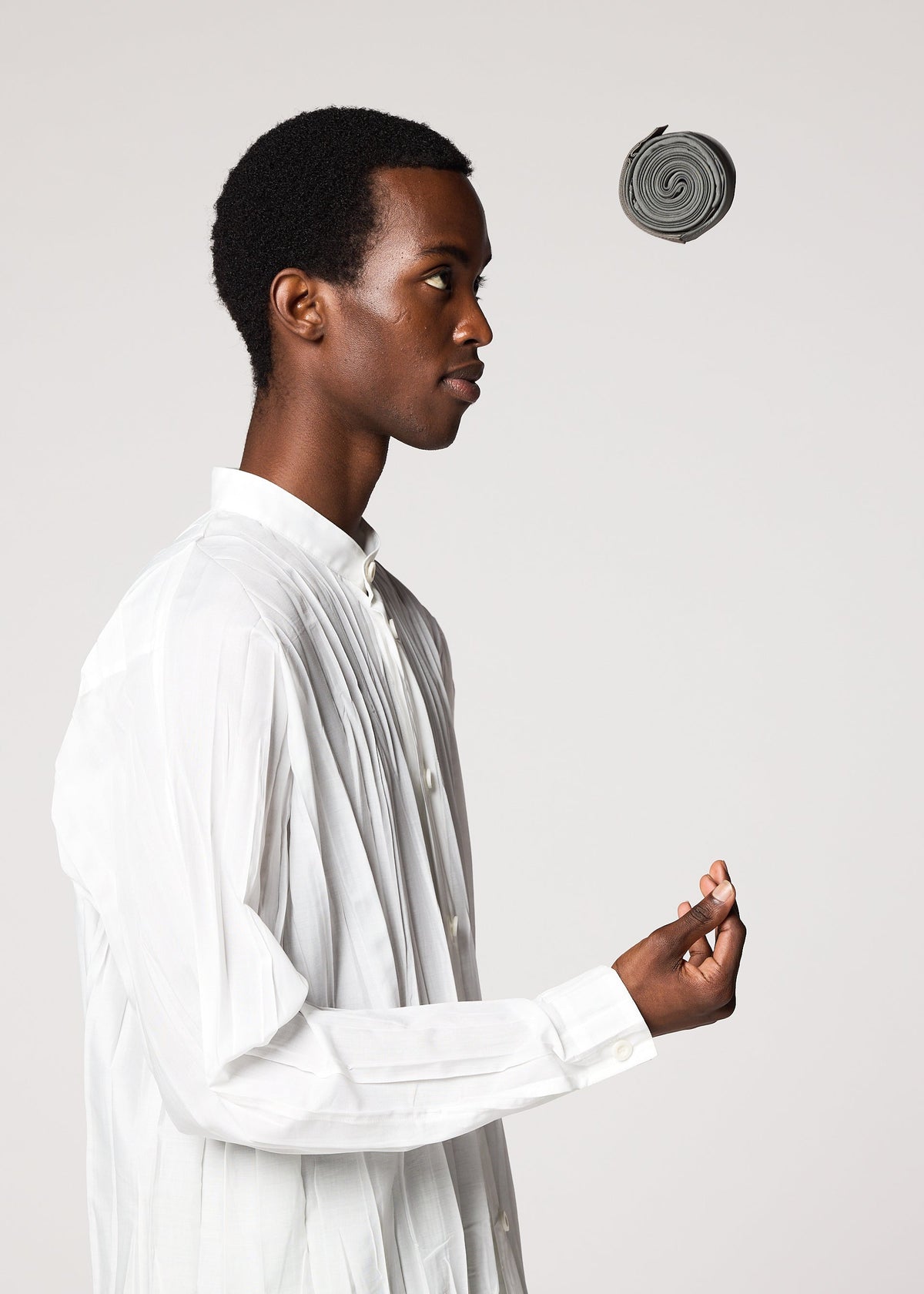 A model wears the IM MEN GURU GURU bag.