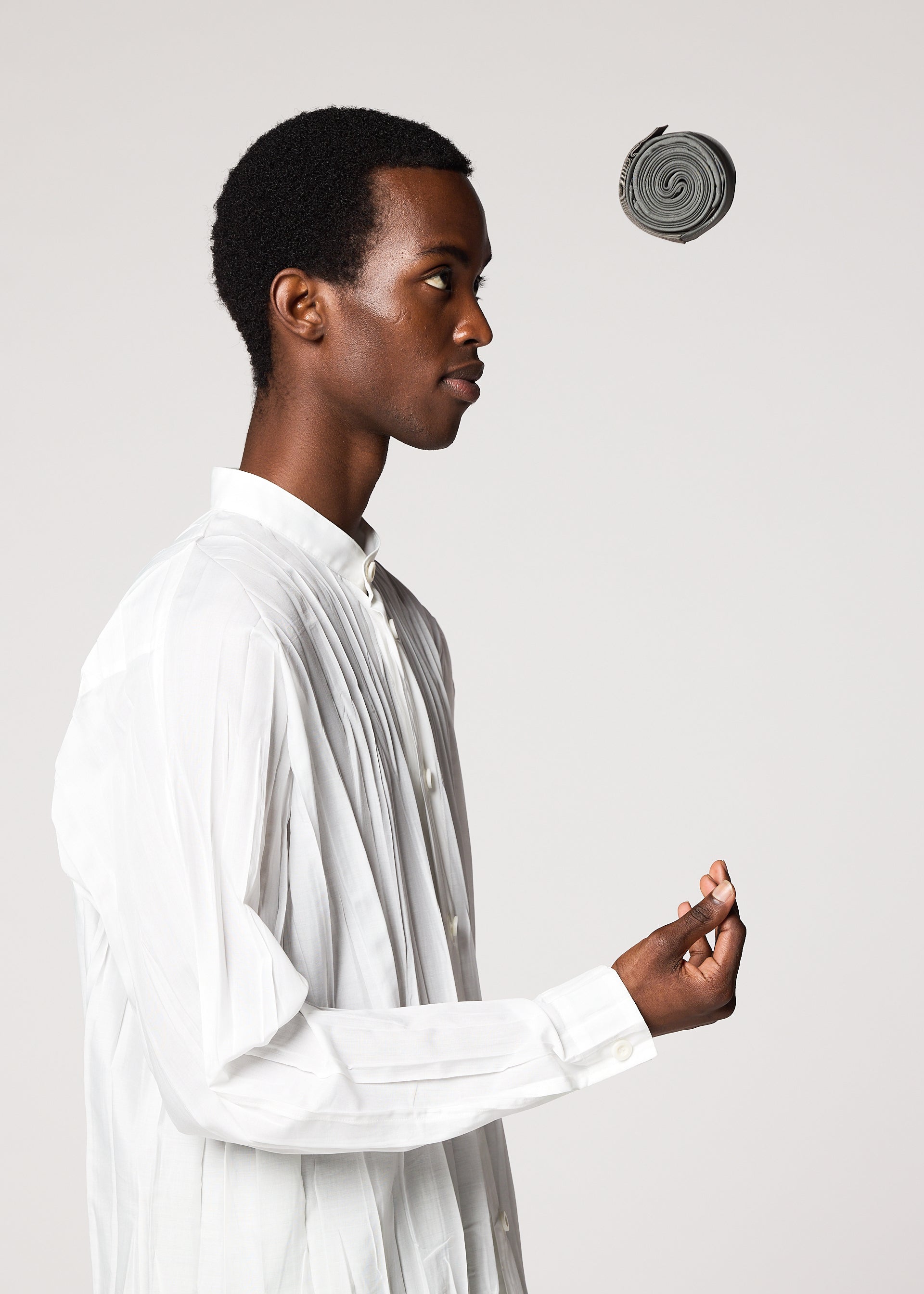 A model wears the IM MEN GURU GURU bag.