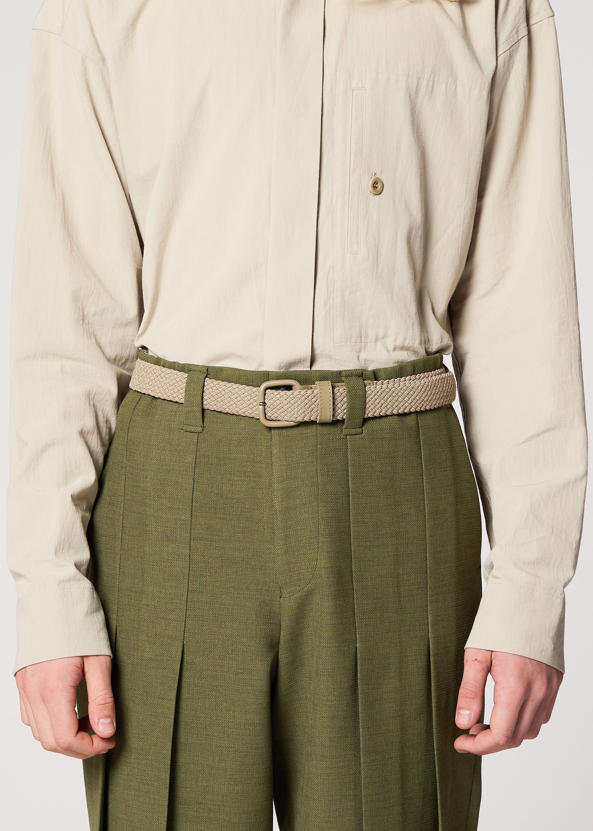 A model wears the IM MEN STRETCH MESH BELT belt.