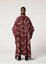 A model wears the IM MEN EARTH coat.