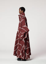 A model wears the IM MEN EARTH coat.