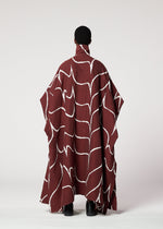 A model wears the IM MEN EARTH coat.