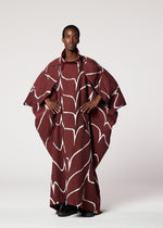 A model wears the IM MEN EARTH coat.