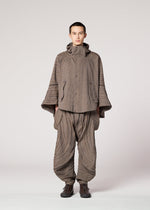 A model wears the IM MEN ENGRAVE clothing.