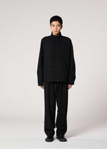 A model wears the IM MEN SHRINK JACQUARD clothing.