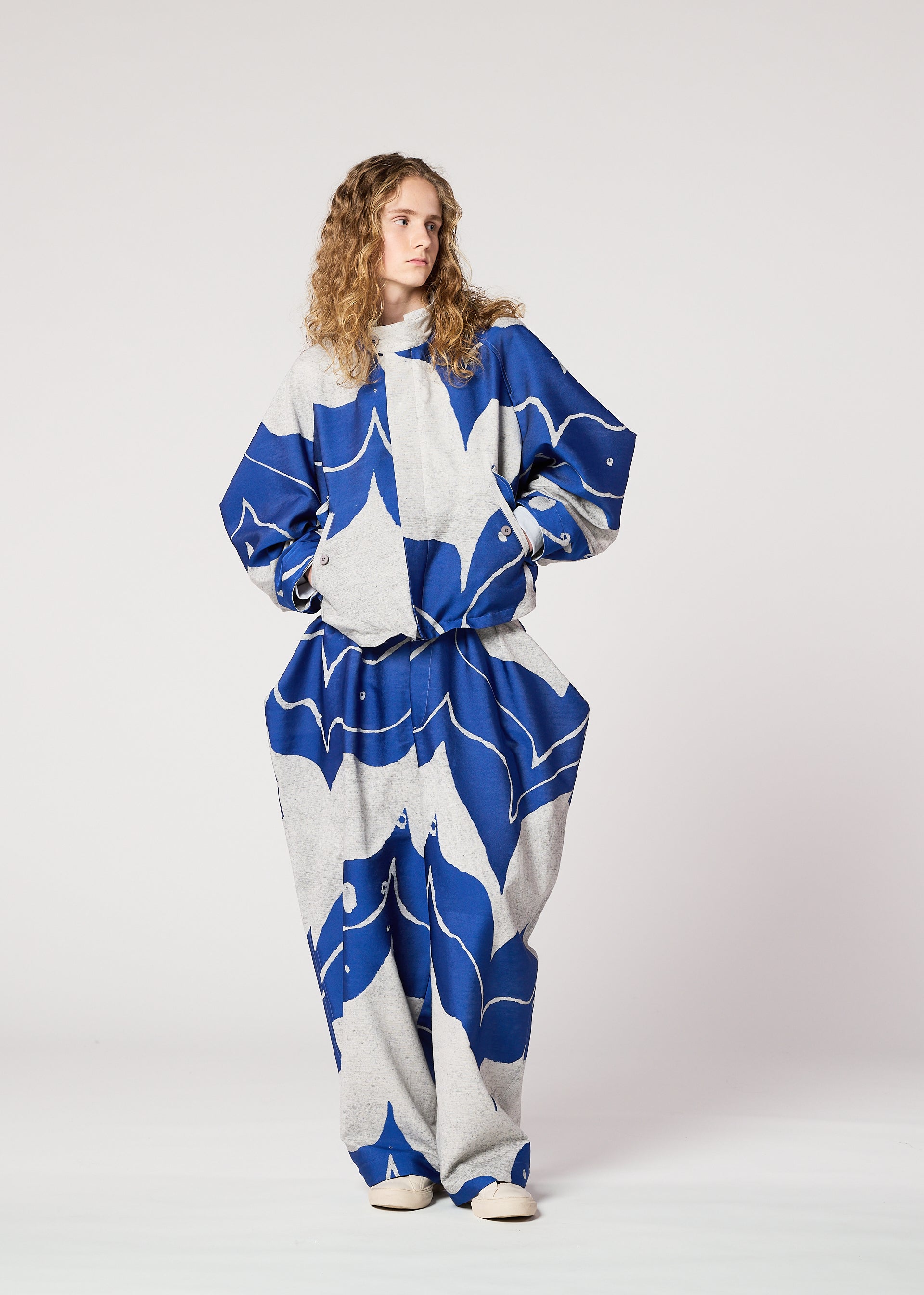 A model wears the IM MEN INLAY jacket.