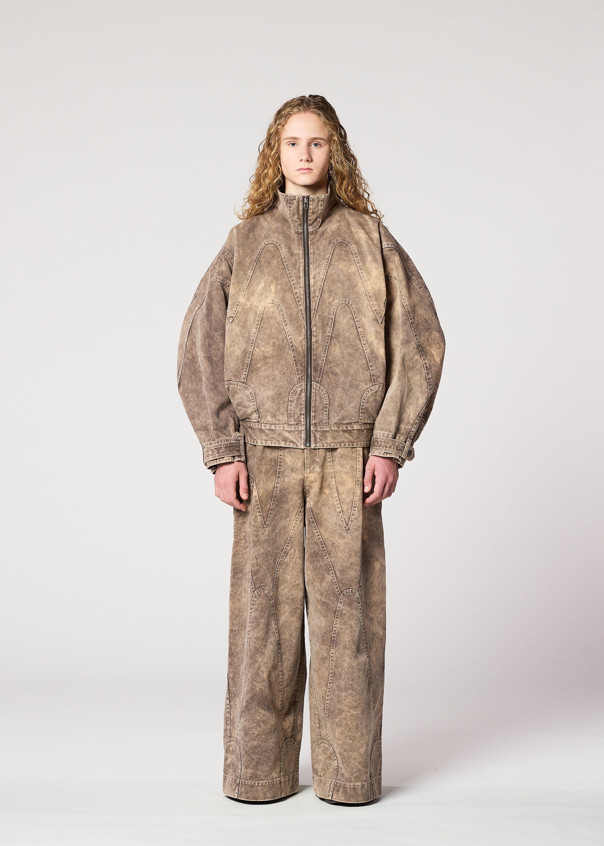 A model wears the IM MEN ELEMENTS jacket.