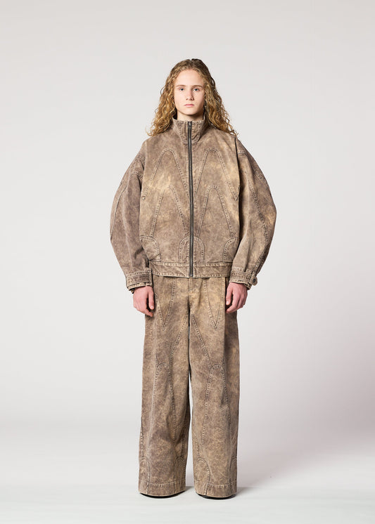 A model wears the IM MEN ELEMENTS jacket.