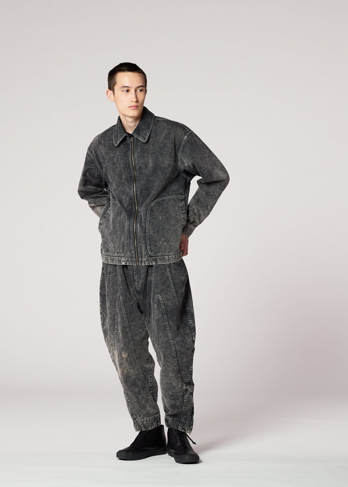 A model wears the IM MEN ELEMENTS jacket.