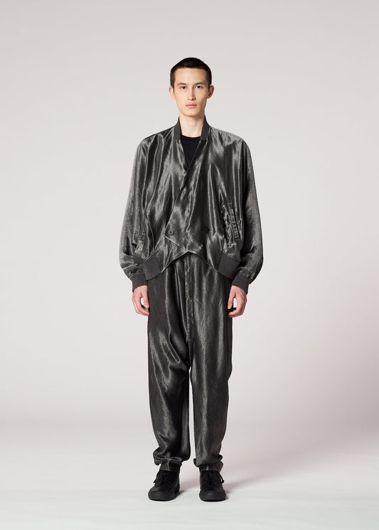 A model wears the IM MEN SATIN WASH jacket.