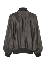 A detail shot of the IM MEN SATIN WASH jacket.