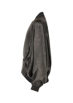 A detail shot of the IM MEN SATIN WASH jacket.