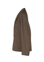 A detail shot of the IM MEN TEXTURES clothing.