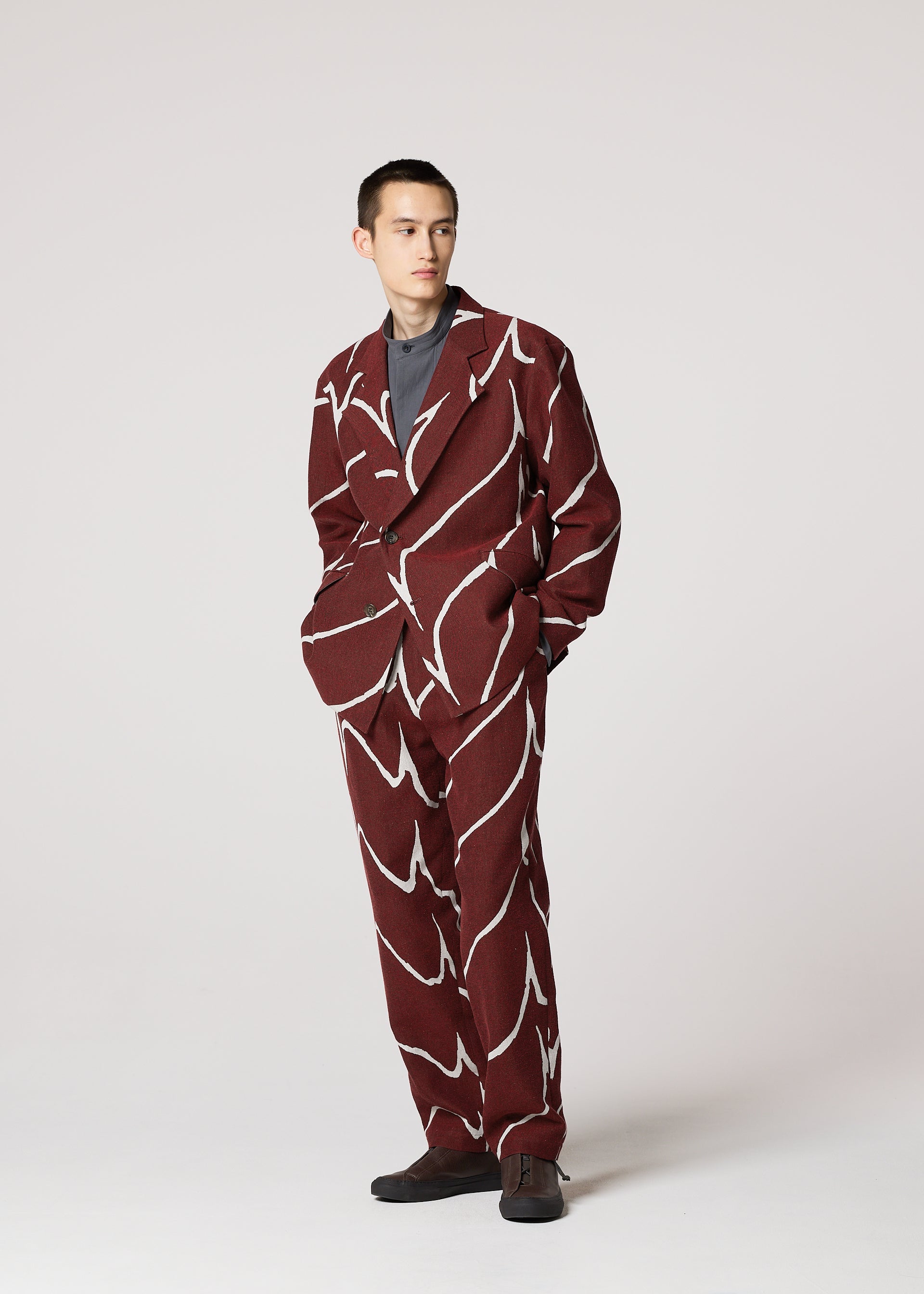 A model wears the IM MEN EARTH jacket.