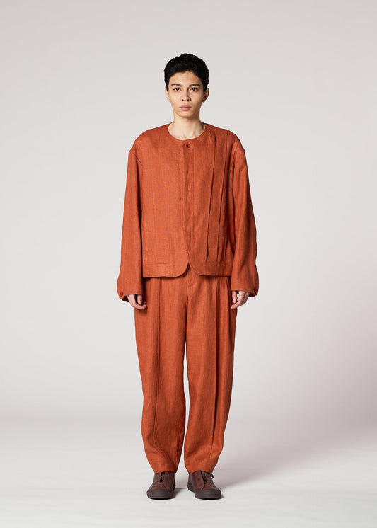 A model wears the IM MEN TOUGH LINEN jacket.