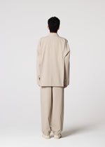 A model wears the IM MEN FLAT jacket.