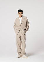 A model wears the IM MEN FLAT jacket.