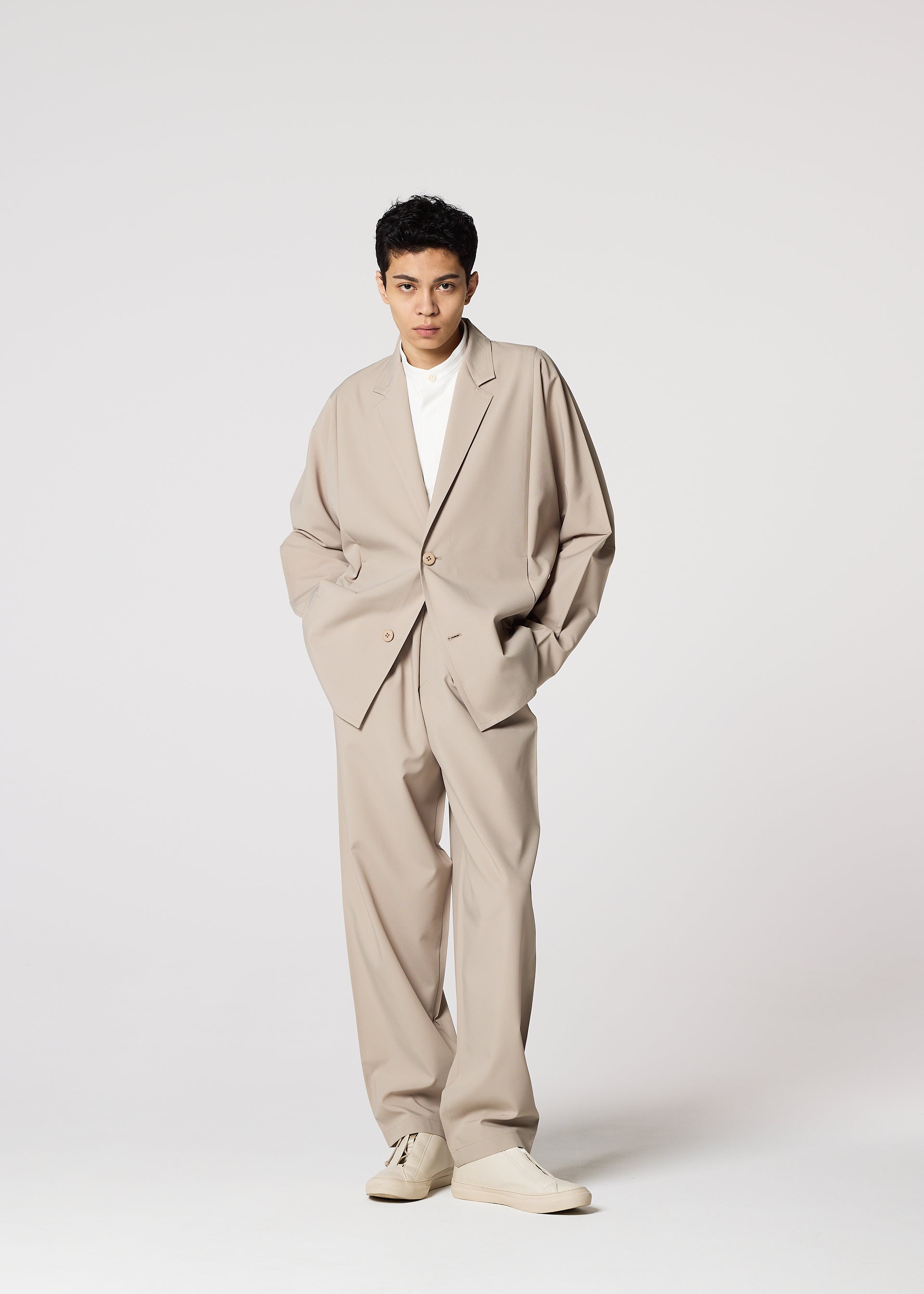 A model wears the IM MEN FLAT jacket.