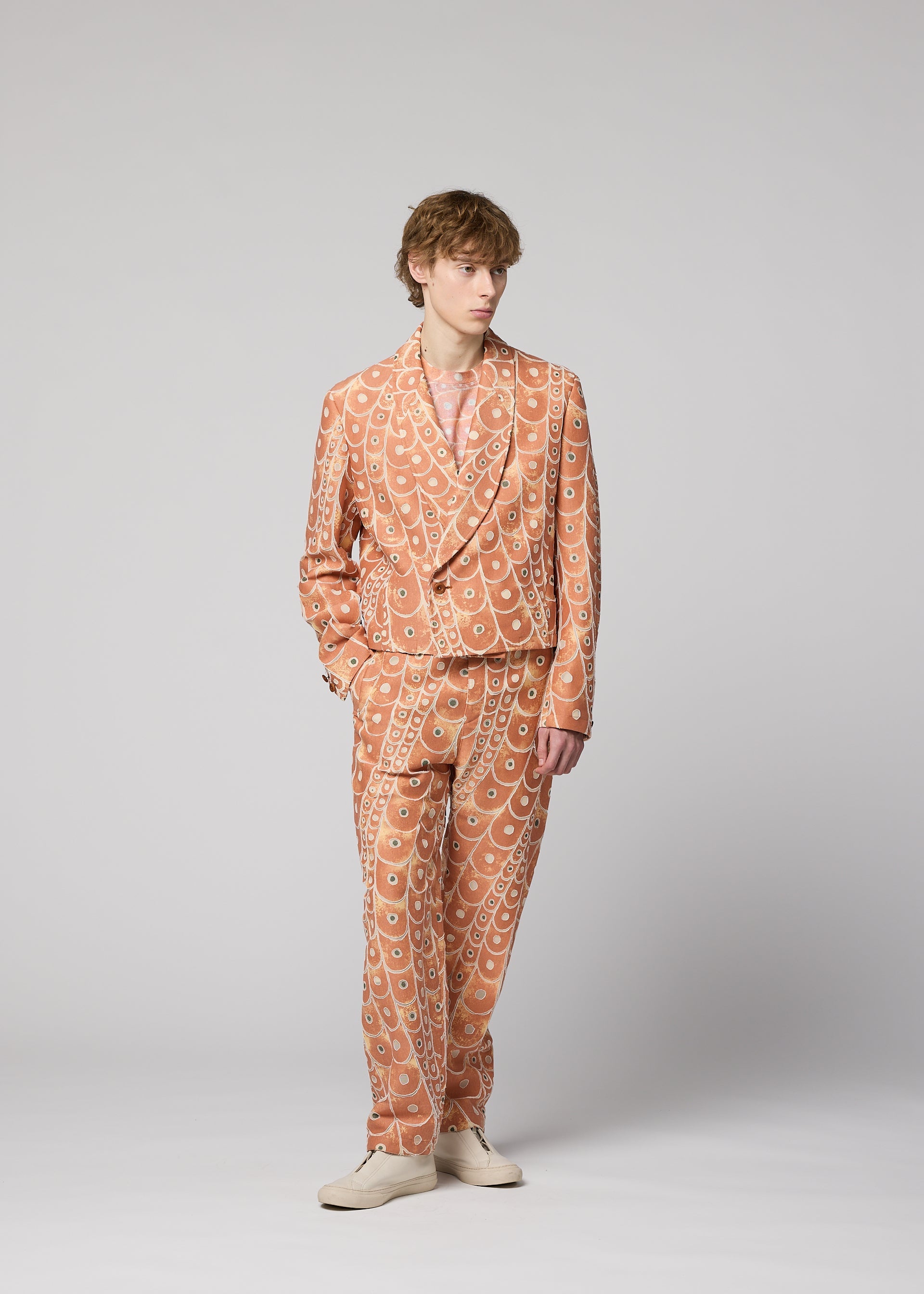 A model wears the IM MEN UROKOMON jacket.