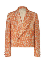 A product shot of the IM MEN UROKOMON jacket in red (24).