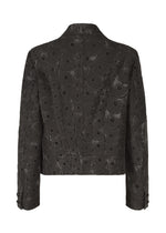 A detail shot of the IM MEN UROKOMON jacket.