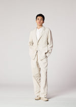 A model wears the IM MEN PIGMENT DOUBLE FACE COTTON jacket.