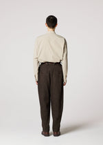 A model wears the IM MEN TEXTURES clothing.