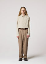 A model wears the IM MEN SHRINK JACQUARD clothing.