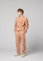 A model wears the IM MEN UROKOMON trousers.