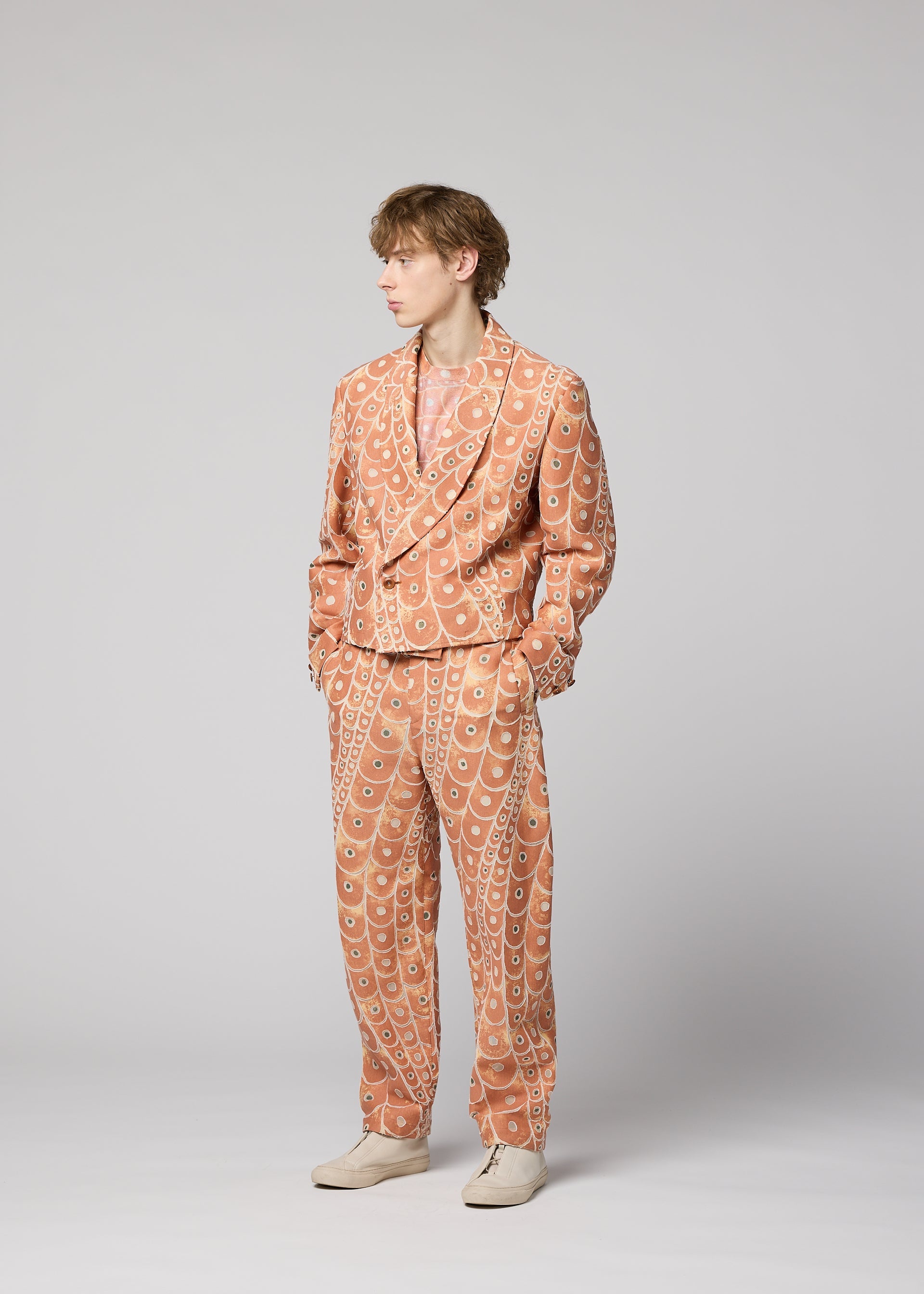 A model wears the IM MEN UROKOMON trousers.