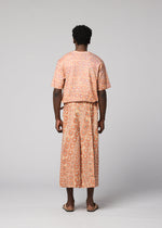 A model wears the IM MEN UROKOMON trousers.