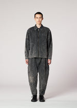 A model wears the IM MEN ELEMENTS trousers.