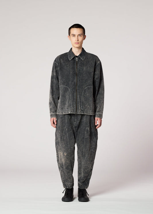 A model wears the IM MEN ELEMENTS trousers.