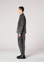 A model wears the IM MEN ELEMENTS trousers.