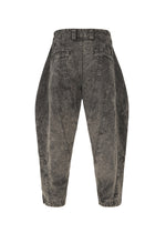 A detail shot of the IM MEN ELEMENTS trousers.