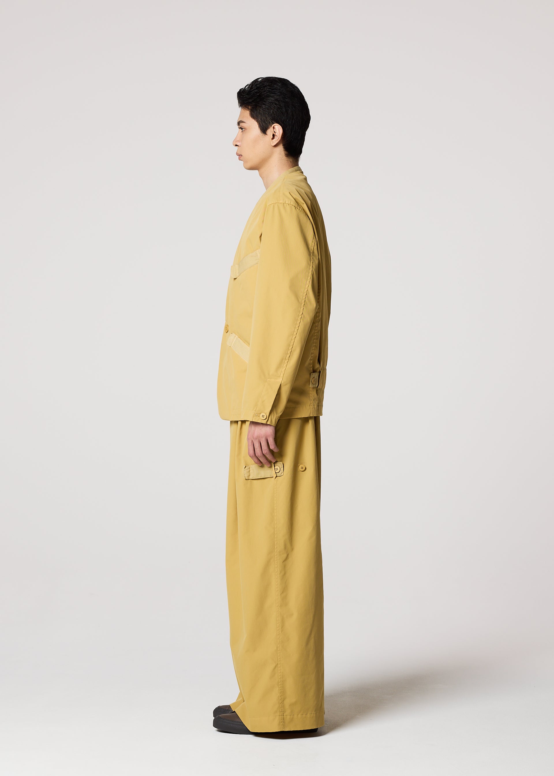 A model wears the IM MEN RESILIENCE trousers.