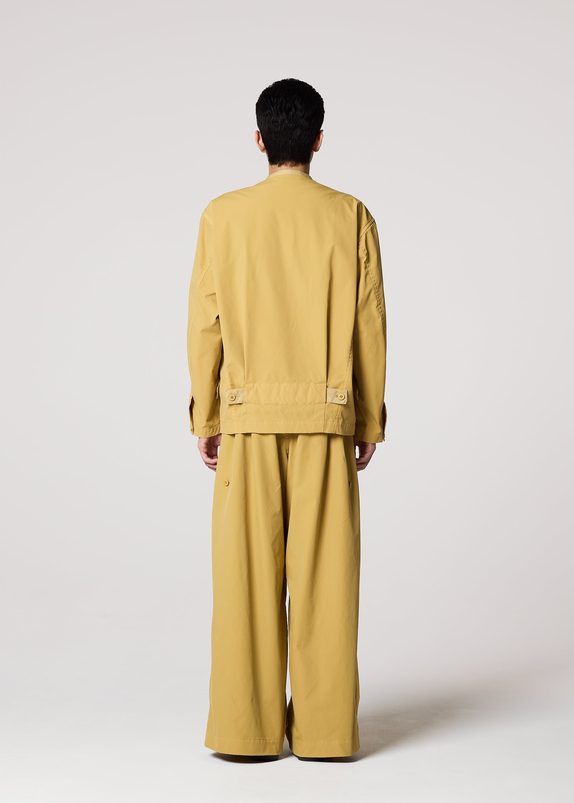A model wears the IM MEN RESILIENCE trousers.