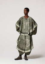 A model wears the IM MEN KAIYU trousers.