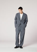 A model wears the IM MEN AIR WASH air-wash-trousers-grey.
